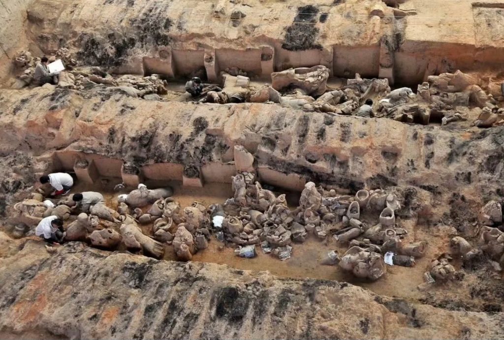 Evidence of extensive fire damage and collapsed timber in Terracotta Warriors