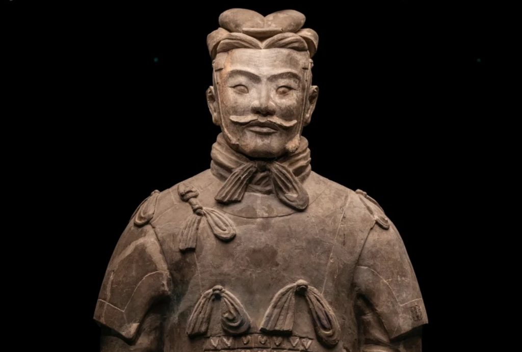 Photos of high-ranking military officer figurines